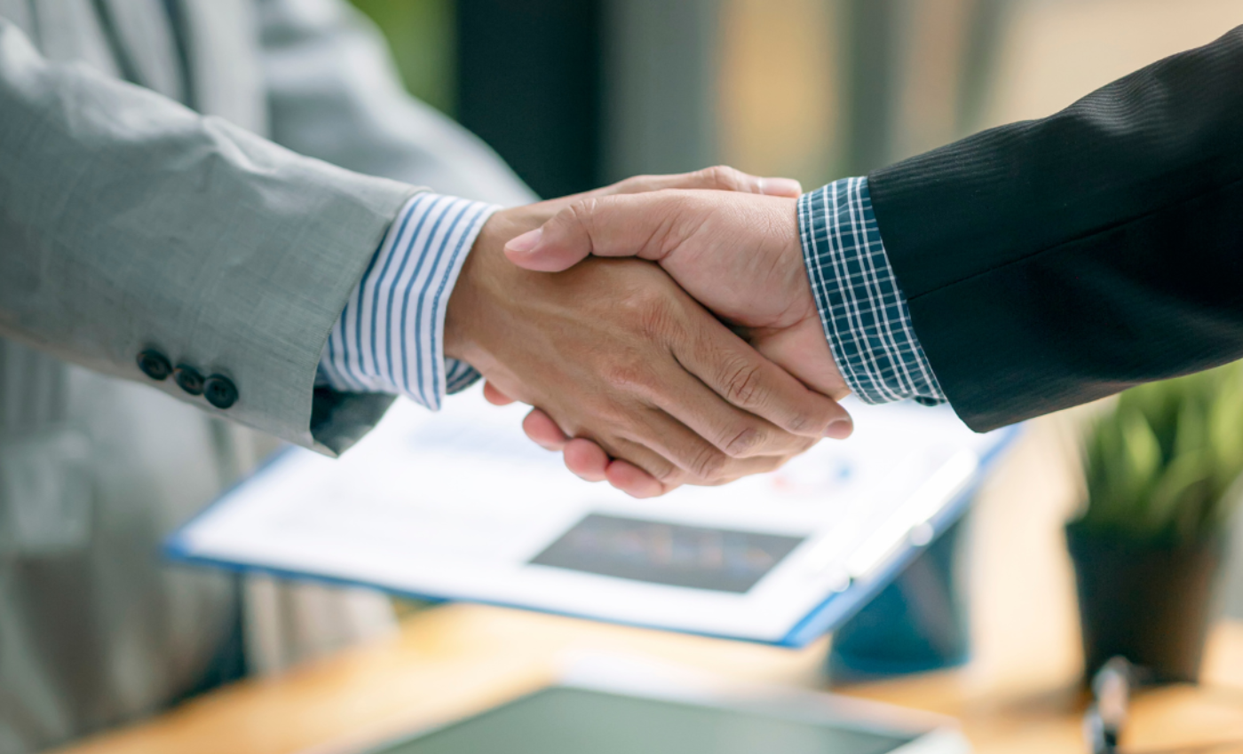 Business men shaking hands